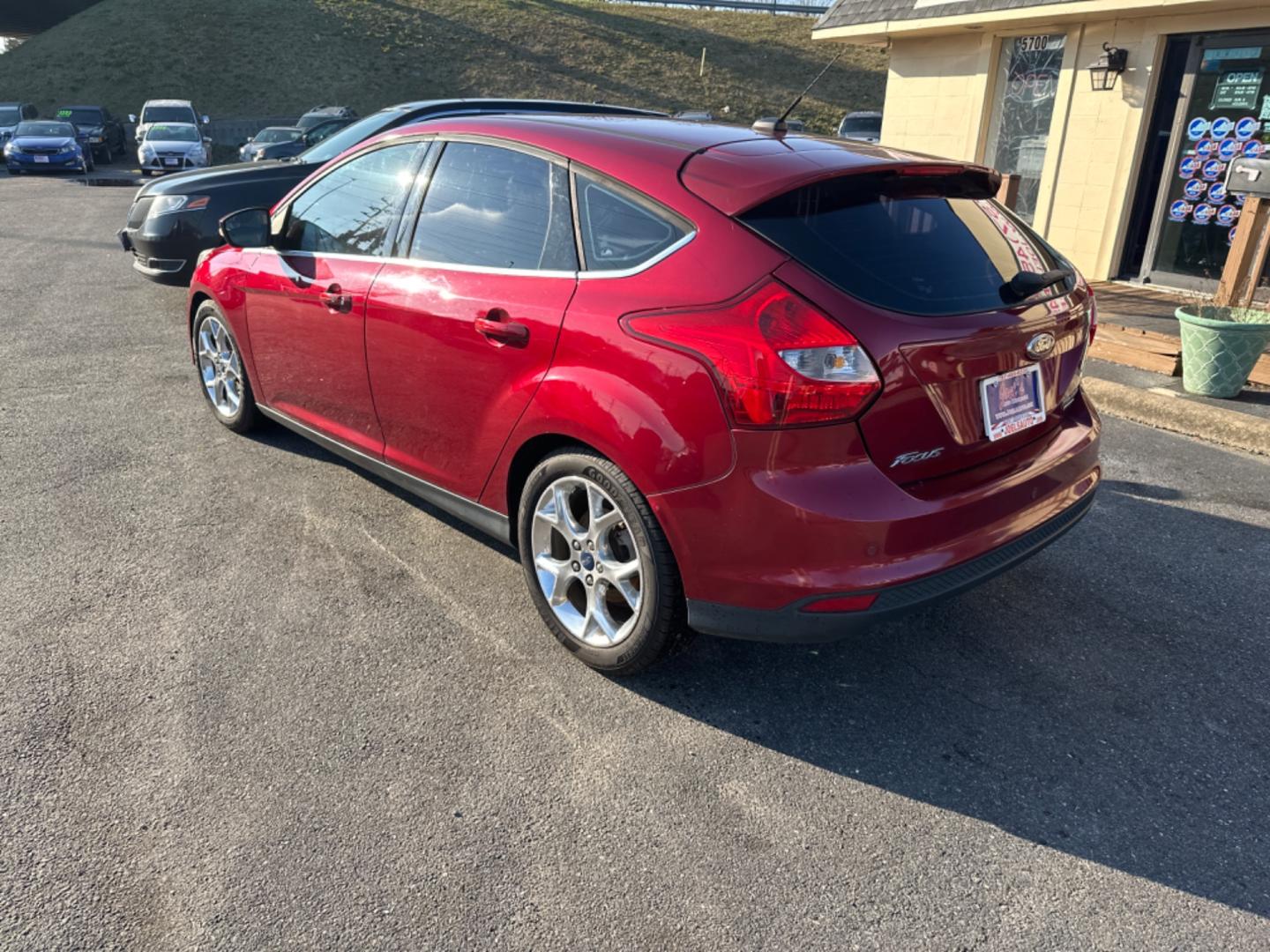 2014 Burgundy Ford Focus (1FADP3N23EL) , located at 5700 Curlew Drive, Norfolk, VA, 23502, (757) 455-6330, 36.841885, -76.209412 - Photo#2